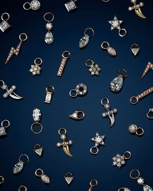Diamond studded pendants in different shapes such as triangles, thunder bolts, stars and snowflakes.
